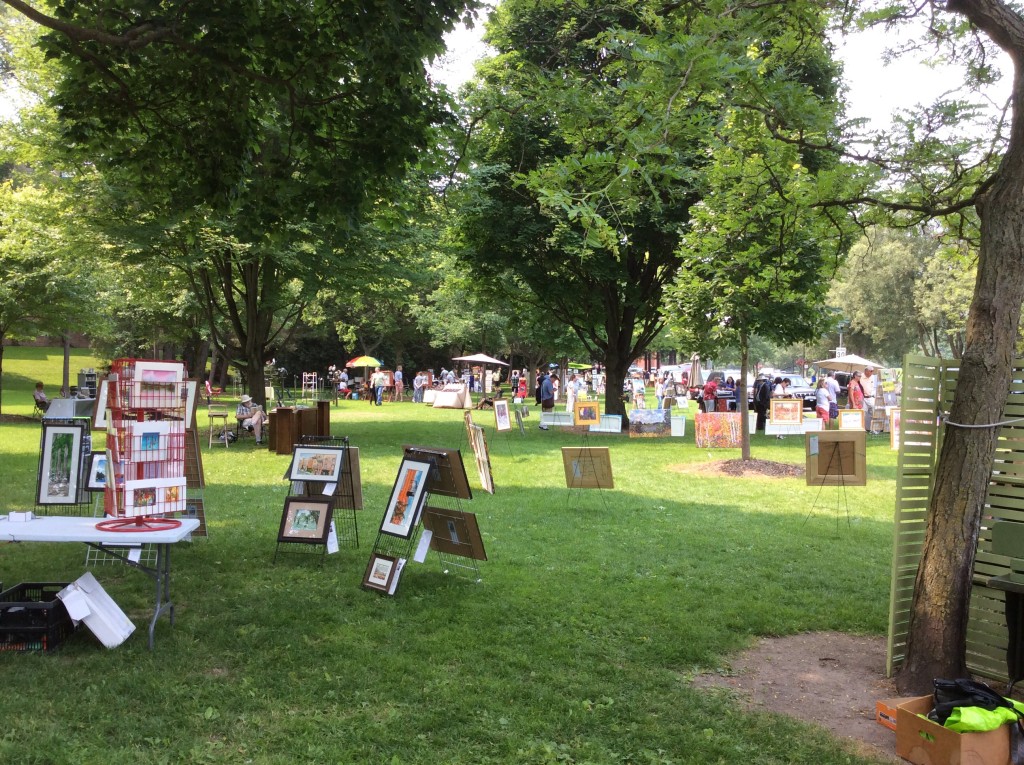 Paintings on display in the park.