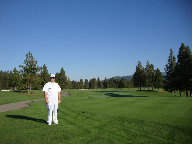 Josh our caddy. Teaches school throughout the year and caddies in the summer. White coveralls just like at the Masters!